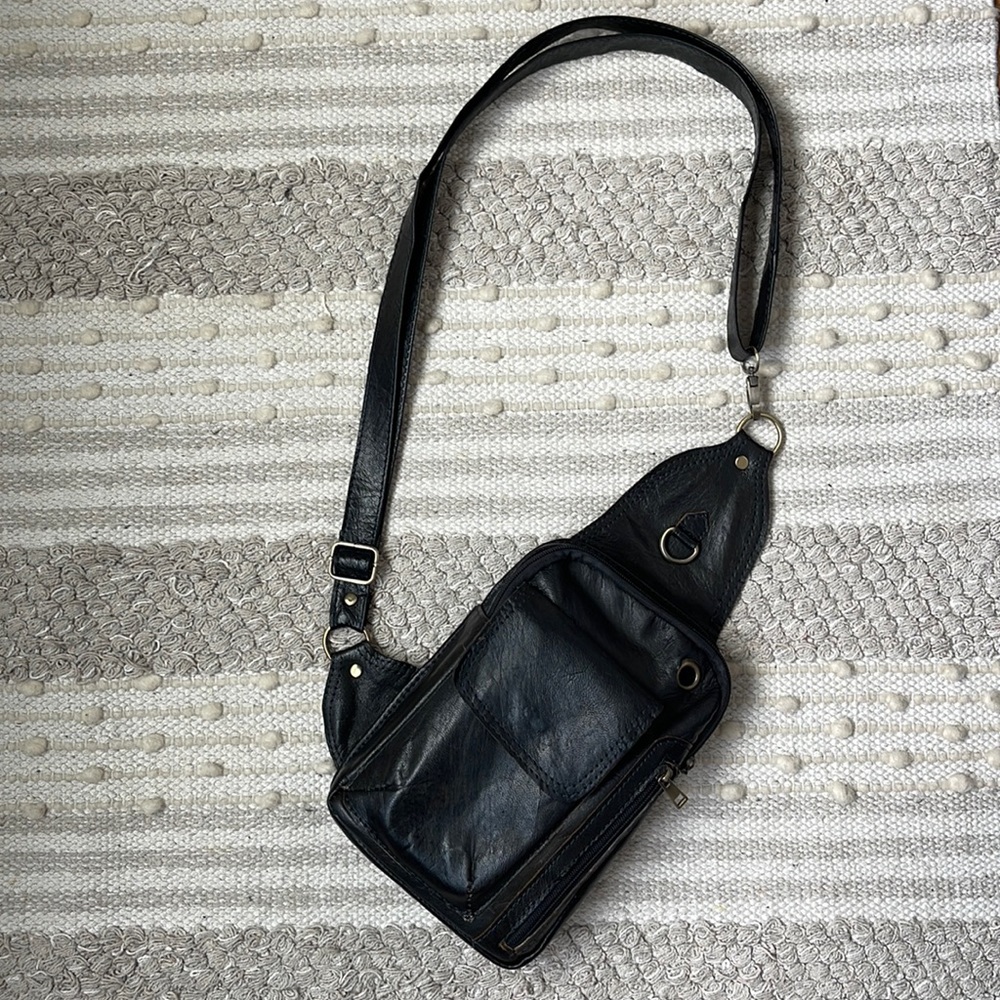 Black leather sling bag